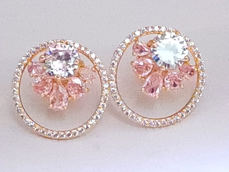 flower inside a ring golden pink & white